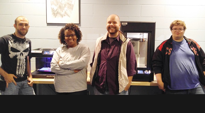 PCC Digital Effects and Animation Technology students, Tyler Rigsbee, Her'rice Burden, Micah Yarber, and Chase Upchurch, shown with the new MakerBot Replicator Z18 3D printer and MakerBot Replicator 3D printer.