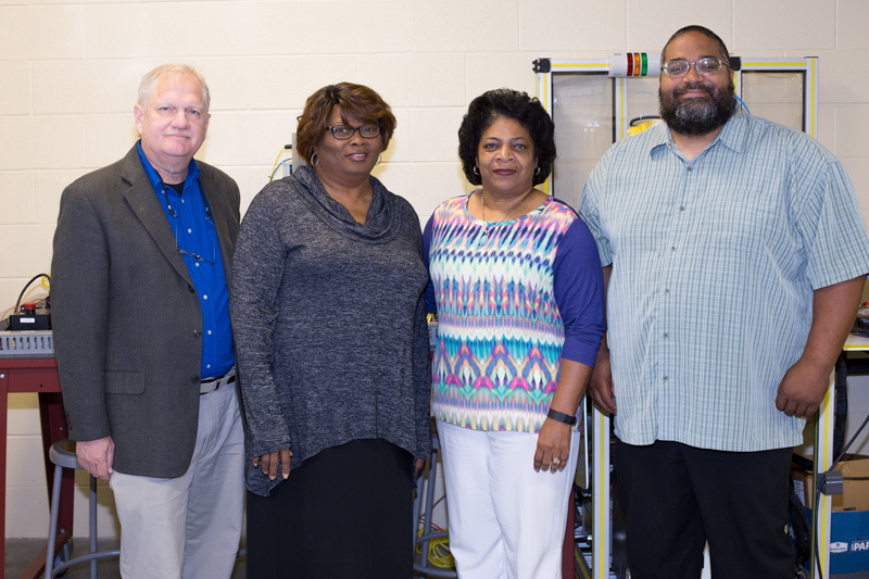 left to right are: Mark Harrill, Gladys Moore, Lucinda Clay, NCWorks Job-Driven program representative, and John David Shaw. Not pictured: Blake Gentry