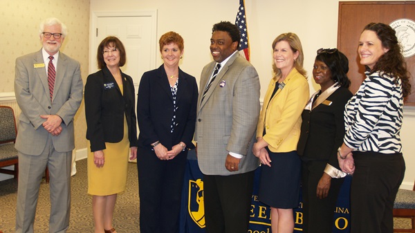 Dr. Walter Bartlett, PCC President; Dr. Robin Remsburg, Dean of UNCG’s School of Nursing; Alisa Montgomery, Dean of Health Sciences and Human Services and Director of ADN Education; Franklin D. Gilliam, UNCG Chancellor; Jacqueline Debrew, UNCG’s RN to BSN Coordinator; Dr. Joyce Johnson, Vice President, Instruction and Student Development; Dawn Oakley, Associate Director, Associate Degree Nursing/Instructor