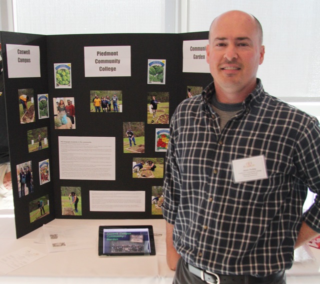 Jason Pulley with Community Garden display